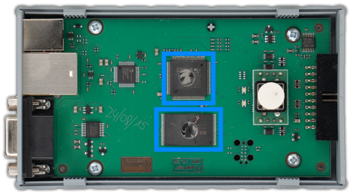 Destroyed circuit board of a Flasher highlighted in blue