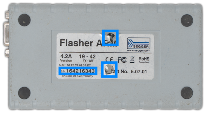 Highlighted intact serial number of destroyed Flasher unit